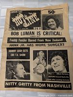 Front page showing masthead, price 50¢, major headlines and photos