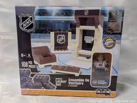 Front of sealed NHL locker set box showing contents and piece count