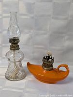 Both oil lamps side by side showing overall forms and condition