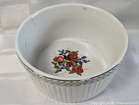 Top view showing fruit motif and rim border