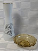 Rosenthal milk glass vase beside amber glass bowl