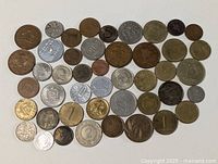 All coins laid out to show obverse designs and relative sizes