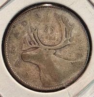 Reverse of 1947 Canadian 25-cent coin showing caribou and date