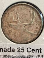 Reverse side of 1960 Canadian quarter showing caribou and CANADA legend