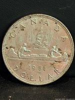 Reverse Voyageur design, date 1961 visible