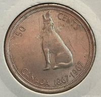 Reverse side showing wolf design and denominations