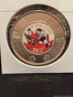 Reverse showing coloured Summit Series design and denomination