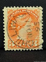 Front of stamp showing denomination, portrait and cancellation