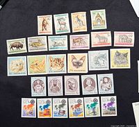 All twenty-eight Magyar Posta stamps laid out in five rows