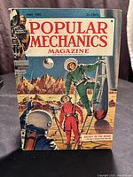 Front cover showing full magazine with lunar rocket artwork