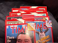 Stack of Time magazines showing multiple red border issues