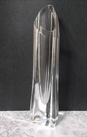 Full view of clear crystal vase standing upright