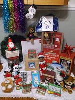 Overall lot showing dishes, boxed sets, plush toys, wreath, star and giftwrap