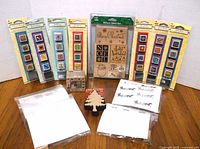 Full lot overview showing sealed blister cards, Christmas value set, used stamps in bags