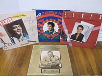 Front view of all four record covers