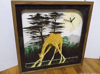 Full frontal view of Welby giraffe shadow box clock