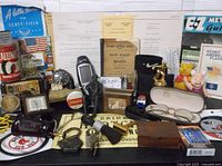 Overall view of assorted vintage items on shelf