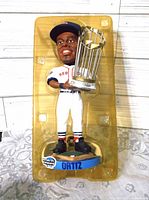 Bobblehead in plastic tray showing figure details