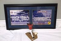 Full view of framed photos with Ortiz figure in front