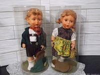 Both Goebel dolls in original plastic tubes