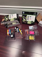 Two boxed HP 920 combo packs with loose cartridges arranged in front