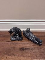 Front view of both soapstone sculptures