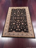 Full view of the carpet laid flat showing pattern and borders