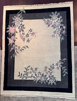 Full view of rug showing design and borders