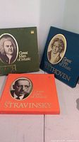 Front view of all three Time Life Great Men of Music box sets Bach (green), Beethoven (blue), Stravinsky (orange)