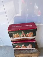 Two retail boxes marked Christmas Traditions stacked