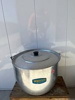 Front view of Wear-Ever aluminum canning pot with lid and label visible