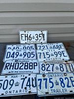 All nine plates laid out to show numbers, provinces and general wear