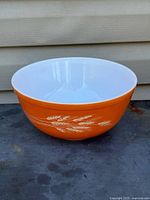 Side view showing orange exterior and wheat pattern