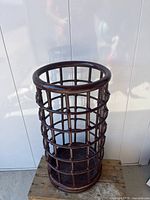 Full view of cylindrical rattan umbrella stand