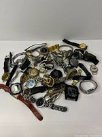 Group shot showing full assortment of wristwatches