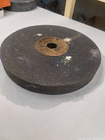 Full view of grinding wheel showing thickness and overall condition