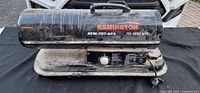 Full view of Remington REM-70T-KFA kerosene heater showing body, carry handle and branding