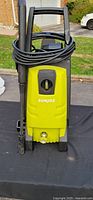 Front view of Sun Joe SPX2500 washer showing body, spray wand, hose and wheels