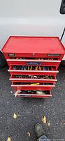 Closed red Mastercraft 4-drawer toolbox front view