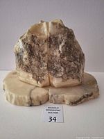 Front view of both alabaster bookends joined