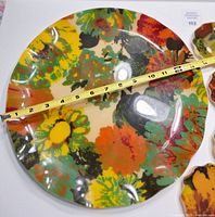 top view of floral tray with measuring tape across