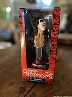 Front view of boxed Gene Simmons statuette