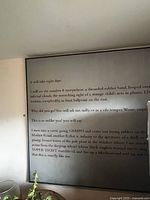 Square framed text print on wall