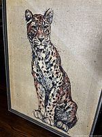 Full view of framed leopard artwork