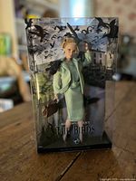 Front of sealed box showing Barbie and film title