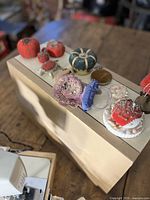 Close view of pin cushions on case lid