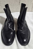 Front view of black leather Chelsea boots