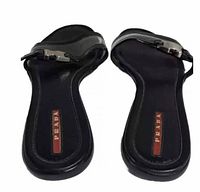 Top view of both sandals showing footbeds and Prada logo