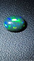 Loose Ethiopian black opal showing play of color