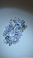 Group of loose marquise and round tanzanite stones